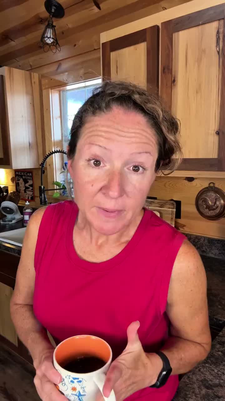 Heather holding her coffee while describing her experience with melatonin mornings