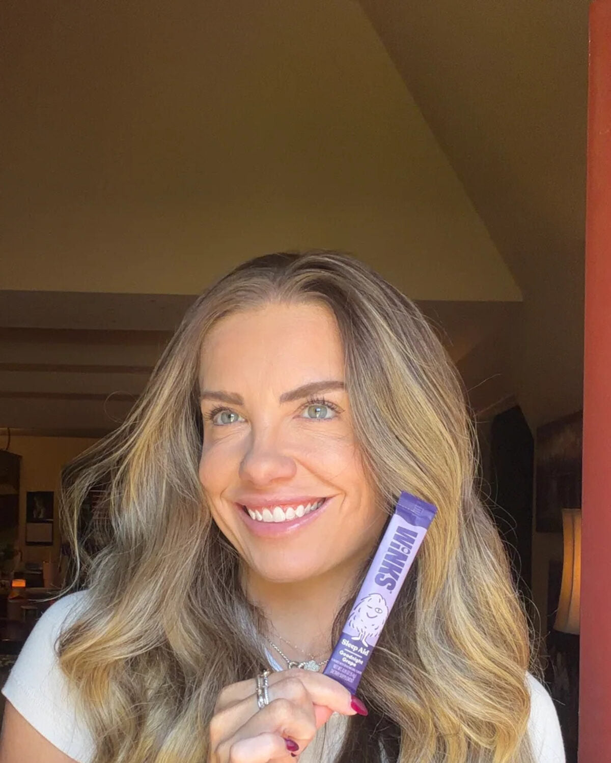 Customer holding a Winks stick pack
